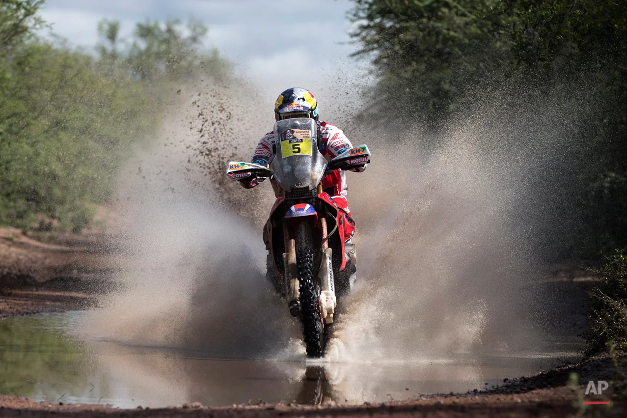 Honda rider Helder Rodrigues of Portugal races during the eleventh stage of the Dakar Rally 2015 between the cities of Termas de Rio Hondo and Rosario, Argentina, Friday, Jan. 16, 2015. The race returned to Argentina after passing through Bolivia and Chile and will finish on Jan. 17 in Buenos Aires. (AP Photo/Felipe Dana)