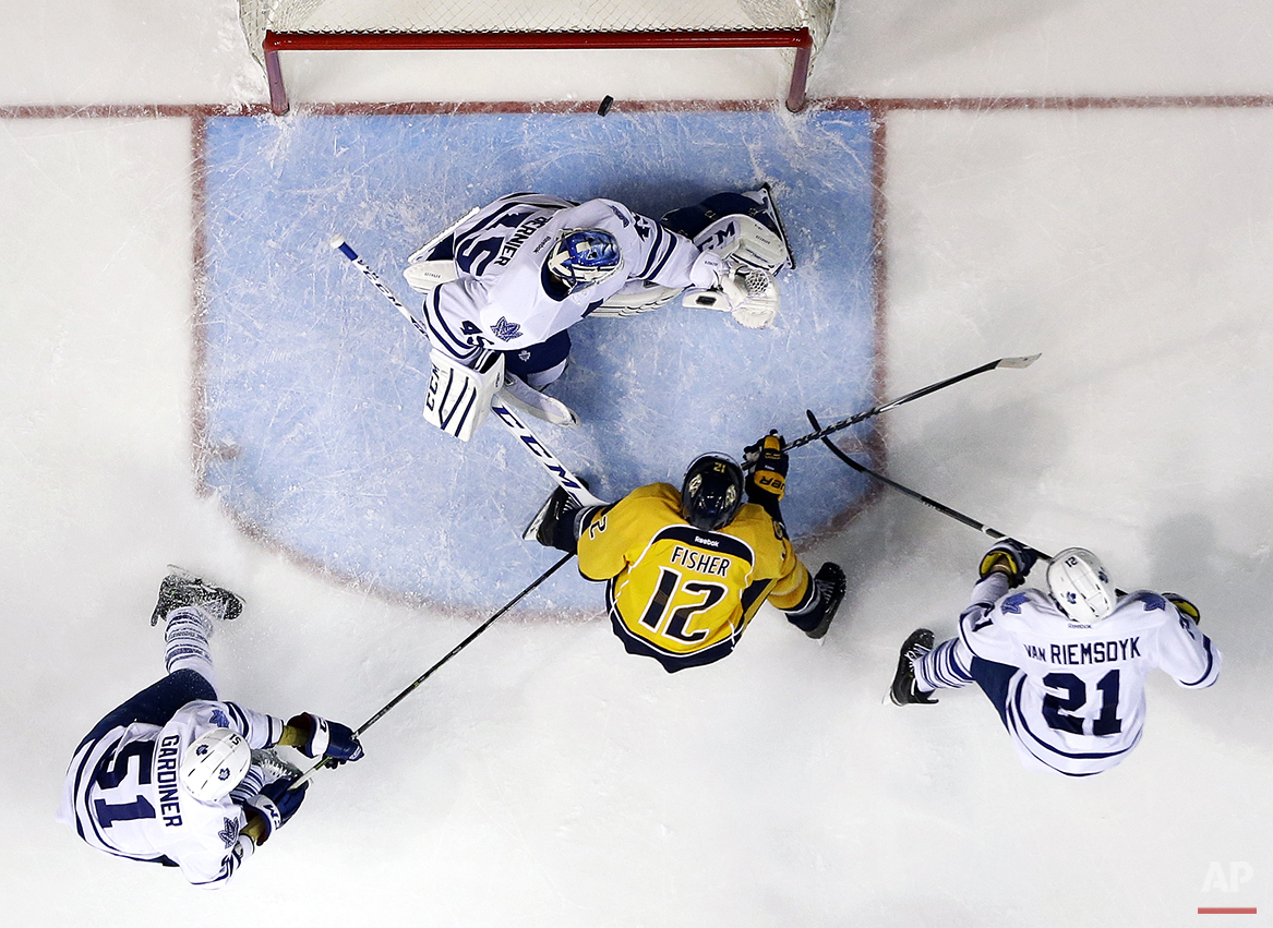 APTOPIX Maple Leafs Predators Hockey