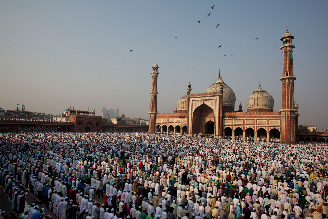 Indian Muslims offer prayers to mark the festival of Eid al-Adha at Jama Masjid in New Delhi, India, Monday, Oct. 6, 2014. Muslims in the country celebrate Eid al-Adha, or the Feast of the Sacrifice, by slaughtering sheep, goats and cows. (AP Photo/Bernat Armangue)