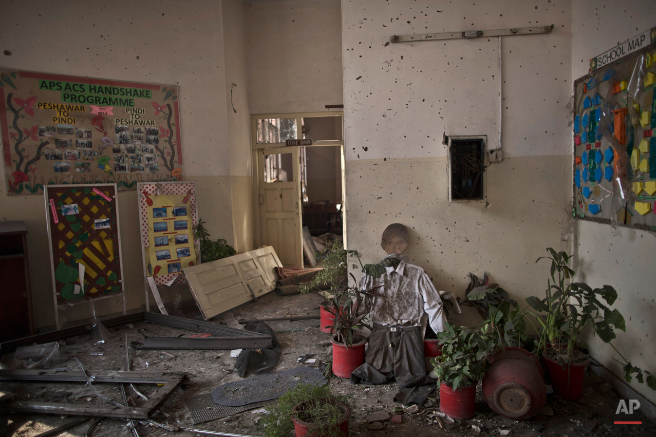  Damages inside the Army Public School attacked last Tuesday by Taliban gunmen, in Peshawar, Pakistan, Thursday, Dec. 18, 2014. The Taliban massacre that killed more than 140 people, mostly children, at a military-run school in northwestern Pakistan 