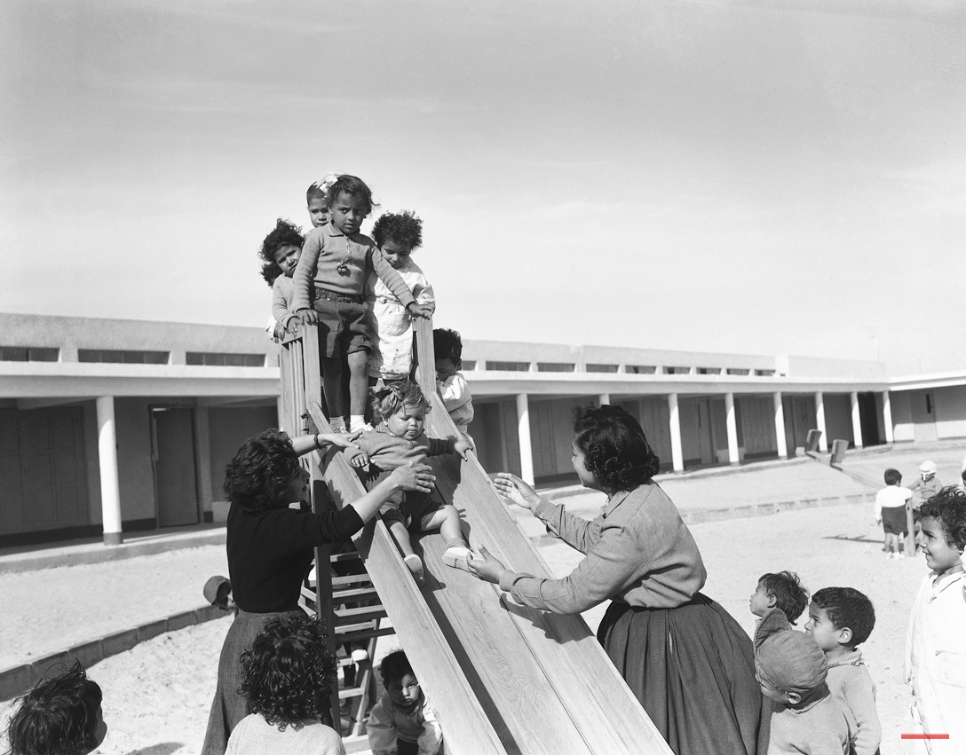  Young Egyptian peasant children play during a mid-day break, on the ground of the new school at Egyptís new farm project in El Tahrir province, Cairo on May 14, 1956. A nurse and teacher supervise the play. (AP Photo/Jim Pringle 