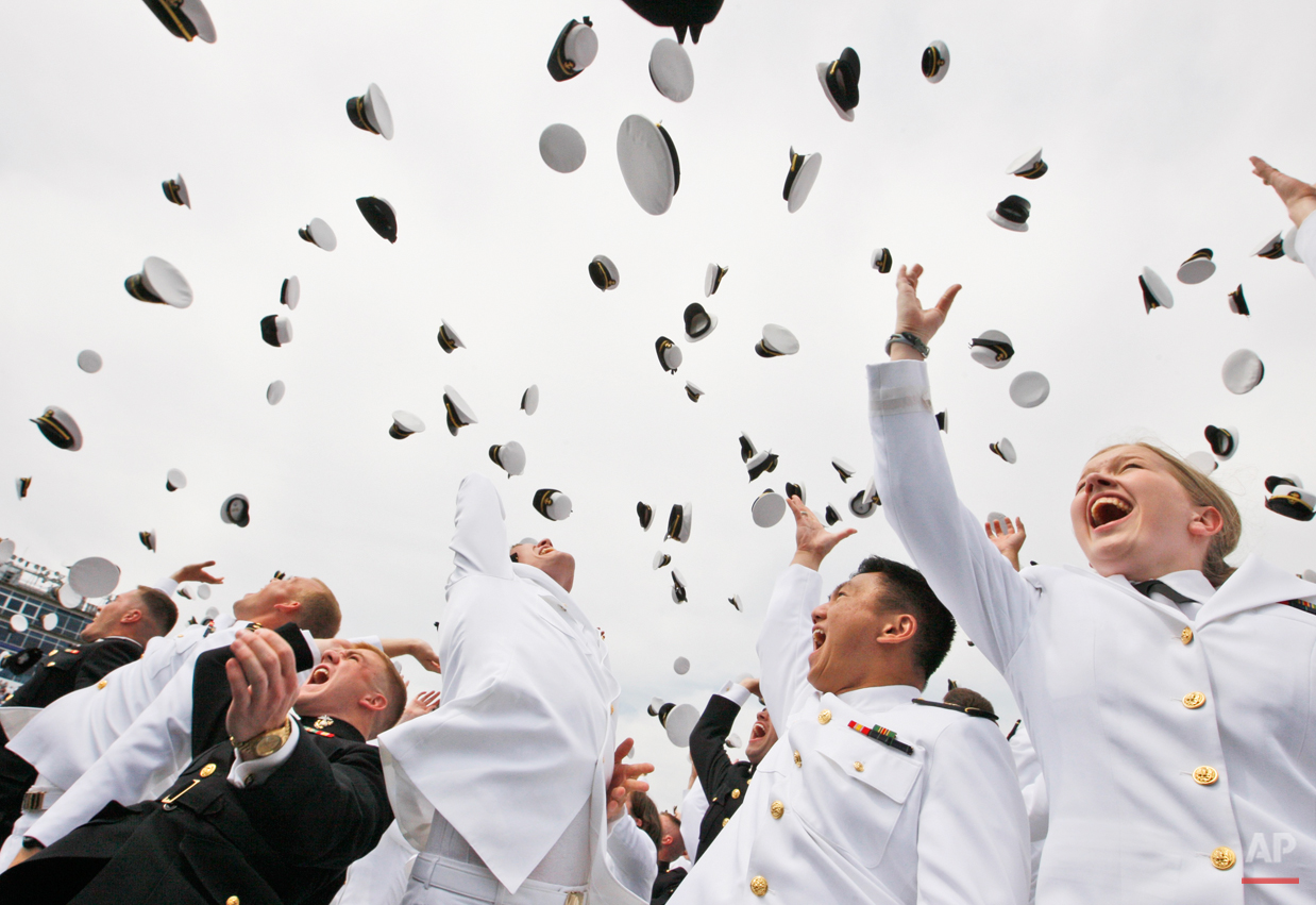  Graduates toss their hats at the end of the United States Naval Academy graduation ceremony attended by President Barack Obama, Friday, May 22, 2009, in Annapolis, Md. (AP Photo/Charles Dharapak) 