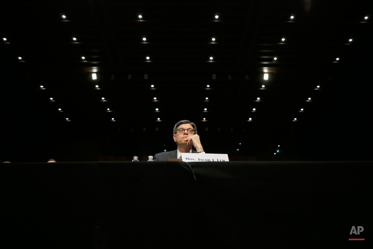  Treasury Secretary Jacob Lew testifies on Capitol Hill in Washington, Wednesday, June 25, 2014, before the Senate Committee hearing to examine the Financial Stability Oversight Council annual report to Congress. (AP Photo/Charles Dharapak) 