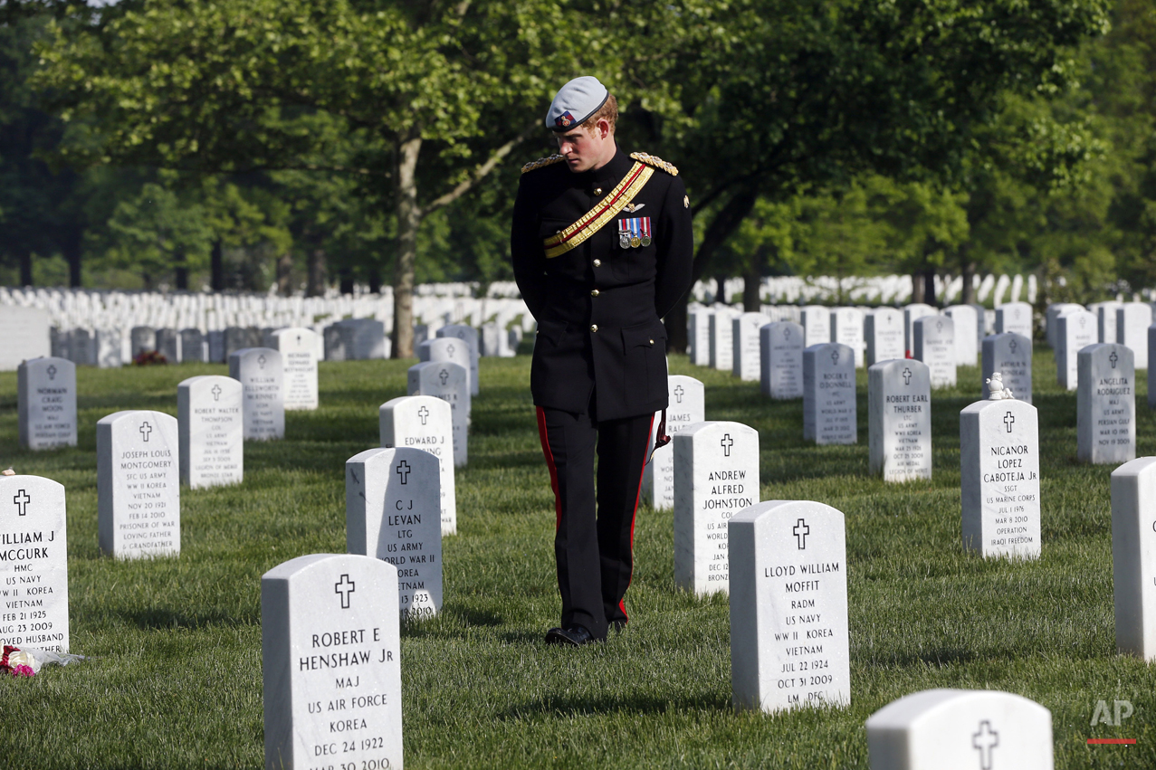  England's Prince Harry visits Section 60 at Arlington National Cemetery, Friday, May 10, 2013. The British soldier-prince is spending most of his week in the U.S. honoring the wounded and the dead of war. (AP Photo/Charles Dharapak, Pool) 