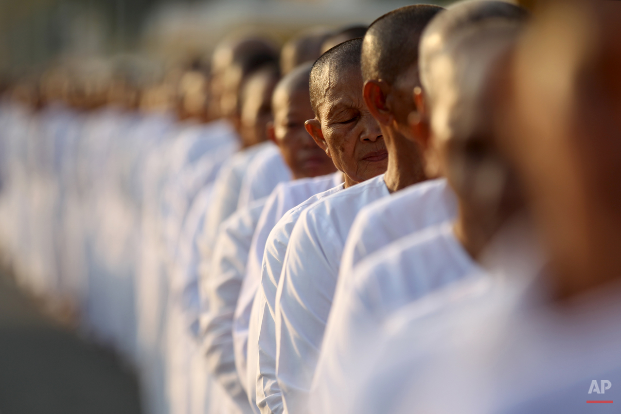  Hundreds of Buddhist nuns wait in line at the Royal Palace to pay their respects to the late former Cambodian King Norodom Sihanouk in Phnom Penh, Saturday, Feb. 2, 2013. Sihanouk's body had been lying in state at the Royal Palace after being flown 