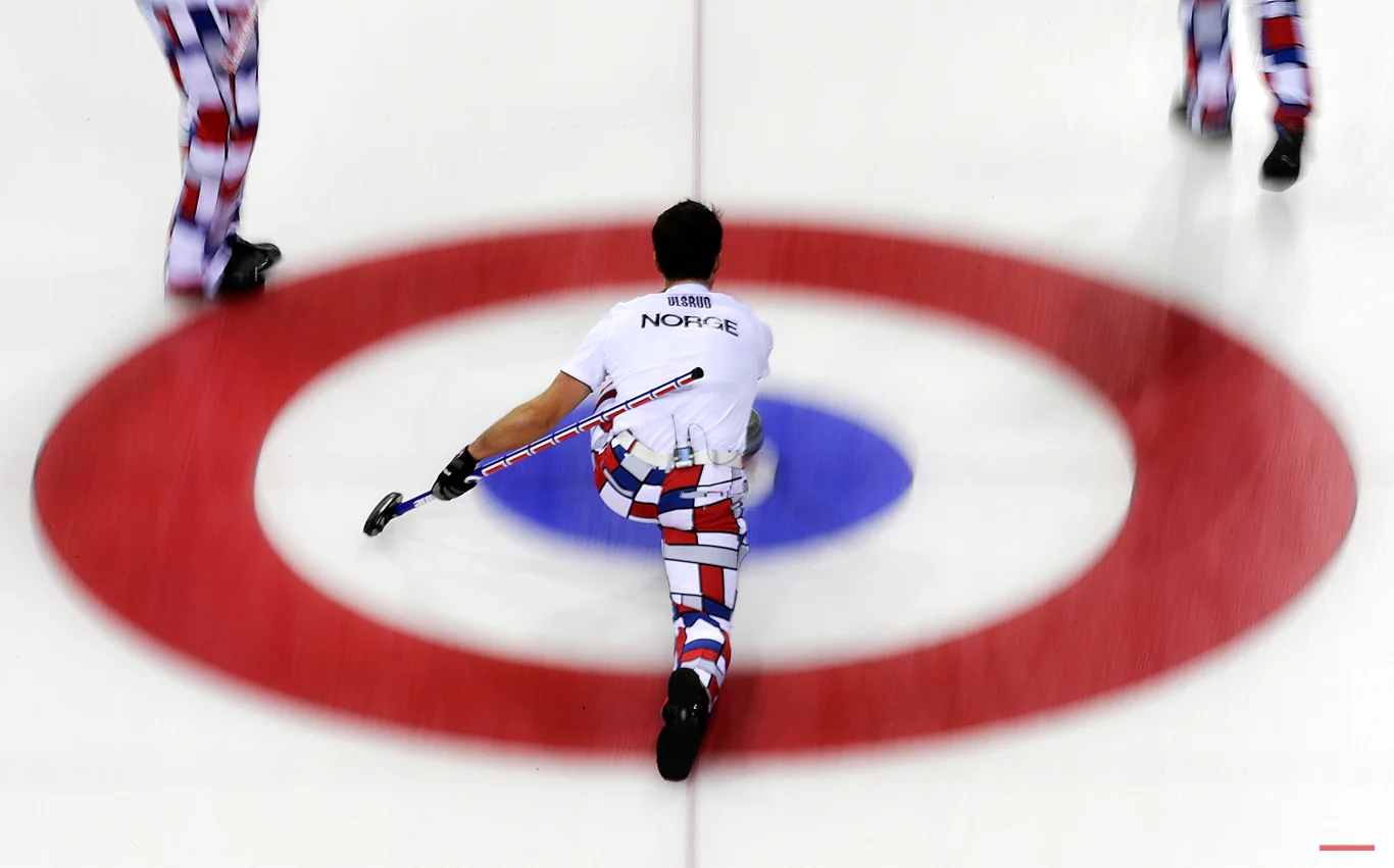 Norway's skip Thomas Ulsrud delivers the rock during the men's curling competition against the United States at the 2014 Winter Olympics, Monday, Feb. 10, 2014, in Sochi, Russia. (AP Photo/Wong Maye-E)