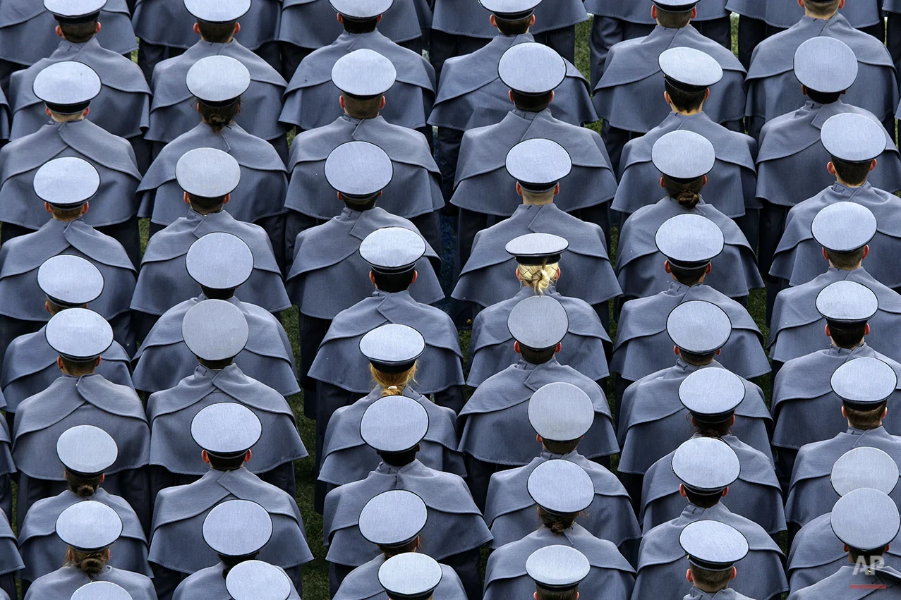 Army cadets march onto the field before an NCAA college football game against the Navy, Saturday, Dec. 14, 2013, in Philadelphia. (AP Photo/Matt Rourke)