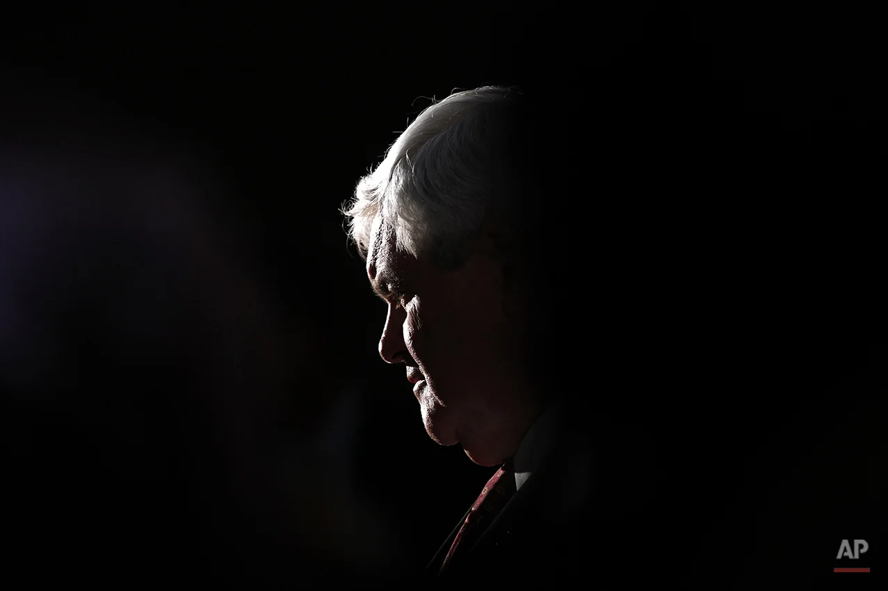 Republican presidential candidate former House Speaker Newt Gingrich speaks to members of the media after an event at a Holiday Inn, Wednesday, Jan. 25, 2012, in Cocoa, Fla. (AP Photo/Matt Rourke)