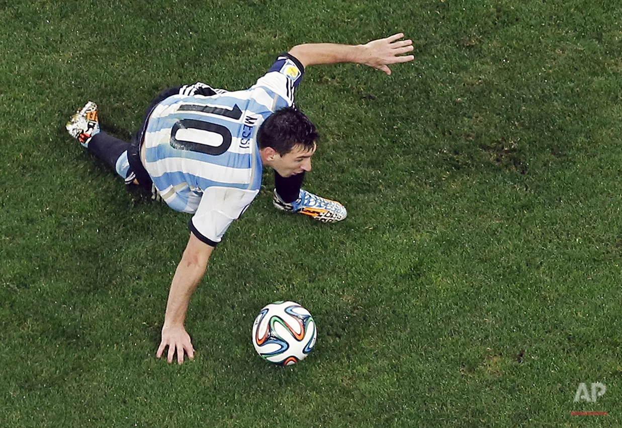Argentina's Lionel Messi controls the ball during the World Cup semifinal soccer match between the Netherlands and Argentina at the Itaquerao Stadium in Sao Paulo, Brazil, Wednesday, July 9, 2014. (AP Photo/Fabrizio Bensch, Pool)