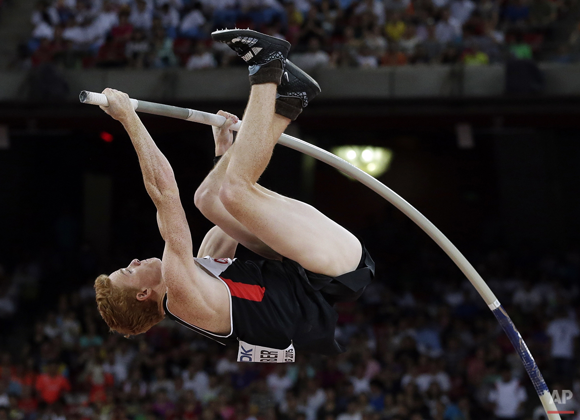  Canada's Shawnacy Barber competes in the men’s pole vault final at the World Athletics Championships at the Bird's Nest stadium in Beijing, Monday, Aug. 24, 2015. (AP Photo/Andy Wong) 
