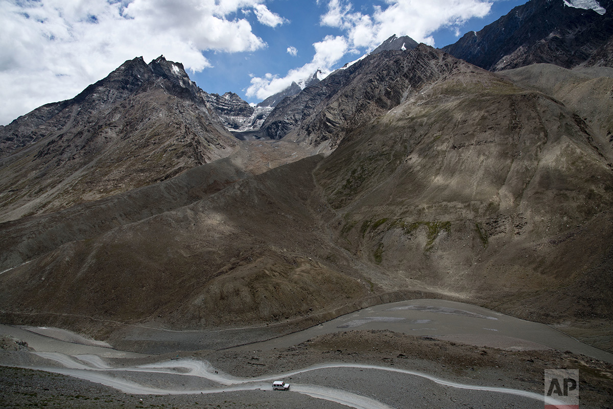  In this Aug. 15, 2016, photo, a jeep drives along the only road that leads to Spiti Valley, a remote Himalayan valley situated at 4000 meter above sea level, India. (AP Photo/Thomas Cytrynowicz) 