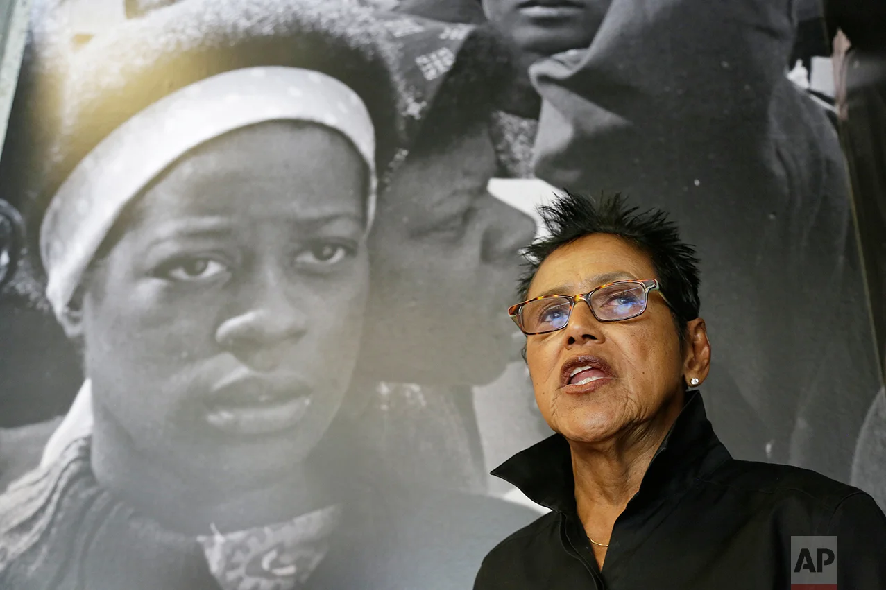 In this photo taken Saturday, Oct. 8, 2016, former Black Panther Party leader Elaine Brown answers questions outside a museum in Oakland, Calif. Hundreds of former Black Panthers from around the world are expected to gather in Oakland, Calif., for a four-day conference that started Thursday, Oct. 20, 2016. The Panthers emerged from the gritty city 50 years ago, declaring a new party dedicated to defending African-Americans against police brutality and protecting their rights. (AP Photo/Eric Risberg)