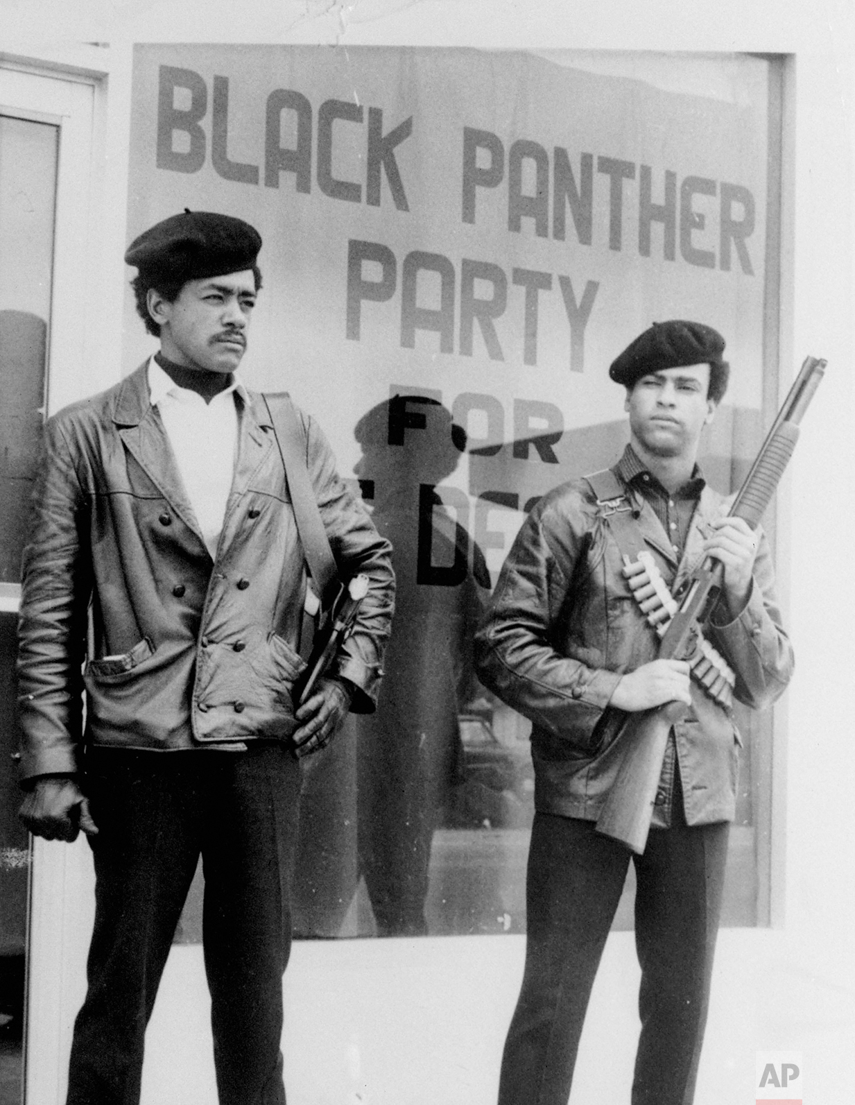  In this undated photo, Black Panther national chairman Bobby Seale, left, wearing a Colt .45, and Huey Newton, right, defense minister with a bandoleer and shotgun are shown in Oakland, Calif. Hundreds of former Black Panthers from around the world are expected to gather in Oakland, Calif., for a four-day conference that started Thursday, Oct. 20, 2016. (The San Francisco Examiner via AP)