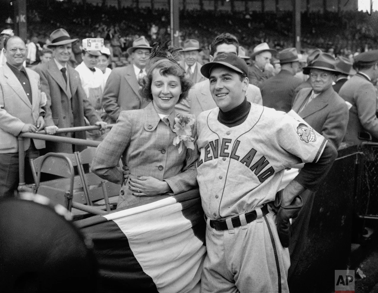 Lou Boudreau and his wife are shown in Boston during the first game of the World Series against the Braves on October 6, 1948. (AP Photo)