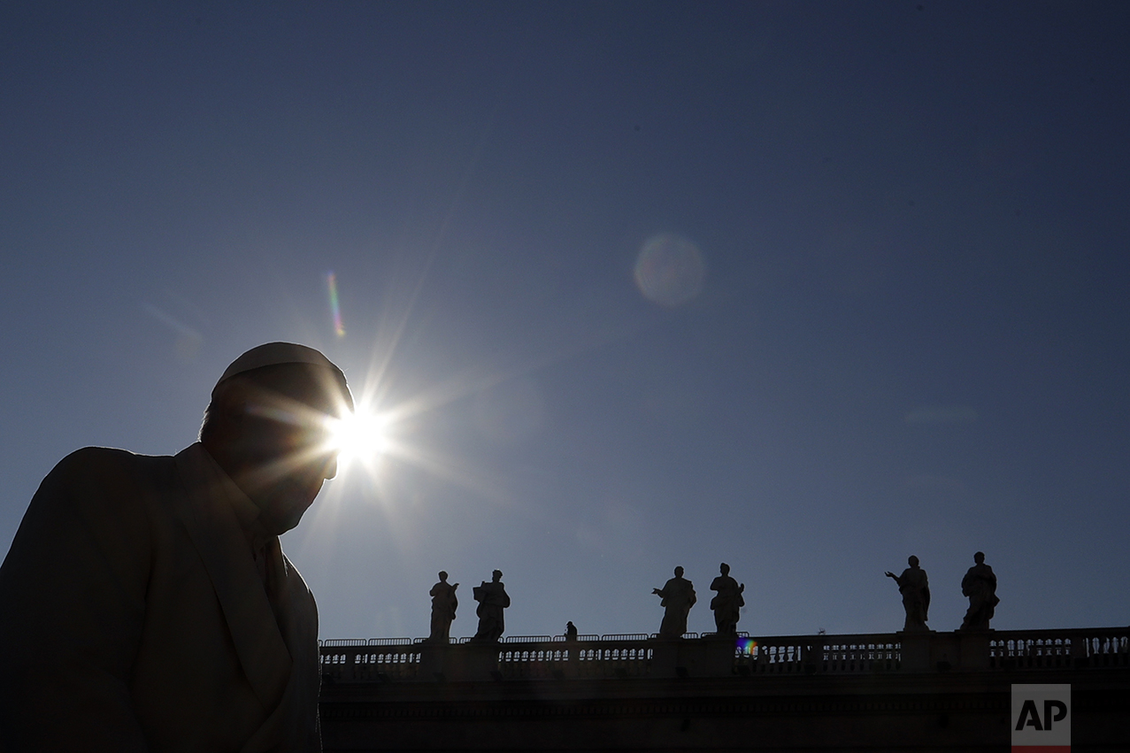 Pope Francis arrives in St. Peter's Square to attend his weekly general audience at the Vatican, Wednesday, Nov. 16, 2016. (AP Photo/Gregorio Borgia)