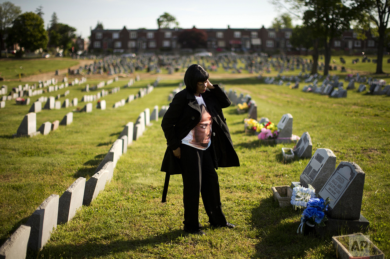  Dorothy Johnson-Speight visits the grave of her son, Khaaliq Jabbar Johnson, in Philadelphia on Monday, May 9, 2016. Johnson was killed in 2001 - shot seven times over a parking space dispute. "We're losing our loved ones at an alarming rate. I don't think that folks that are fighting and talking about the second amendment understand us. We don't want to take the rights of responsible gun owners away from those people. We just don't want our loved ones to be murdered on the streets of Philadelphia and cities across the country because they have the opportunity to get guns so easily," she says. "People with long criminal history records like the person who killed my son, like people with mental health challenges, they should't have guns." Johnson-Speight is the director of Mothers In Charge, a group that "advocates for families affected by violence and provides counseling and grief support services for families when a loved one has been murdered." (AP Photo/Matt Rourke)