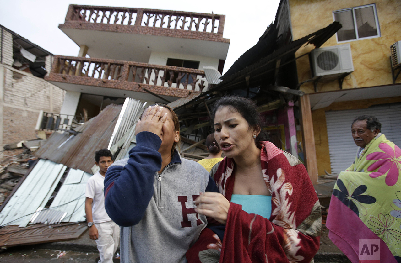  A woman cries as she stands next to a house destroyed by the earthquake in the Pacific coastal town of Pedernales, Ecuador, on April 17, 2016. The strongest earthquake to hit Ecuador in decades flattened buildings and buckled highways along its Paci