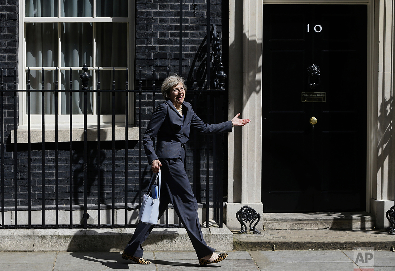  Britain's Home Secretary Theresa May leaves 10 Downing Street in London after attending a cabinet meeting there on July 12, 2016. May has become Britain's new Prime Minister. (AP Photo/Kirsty Wigglesworth) 