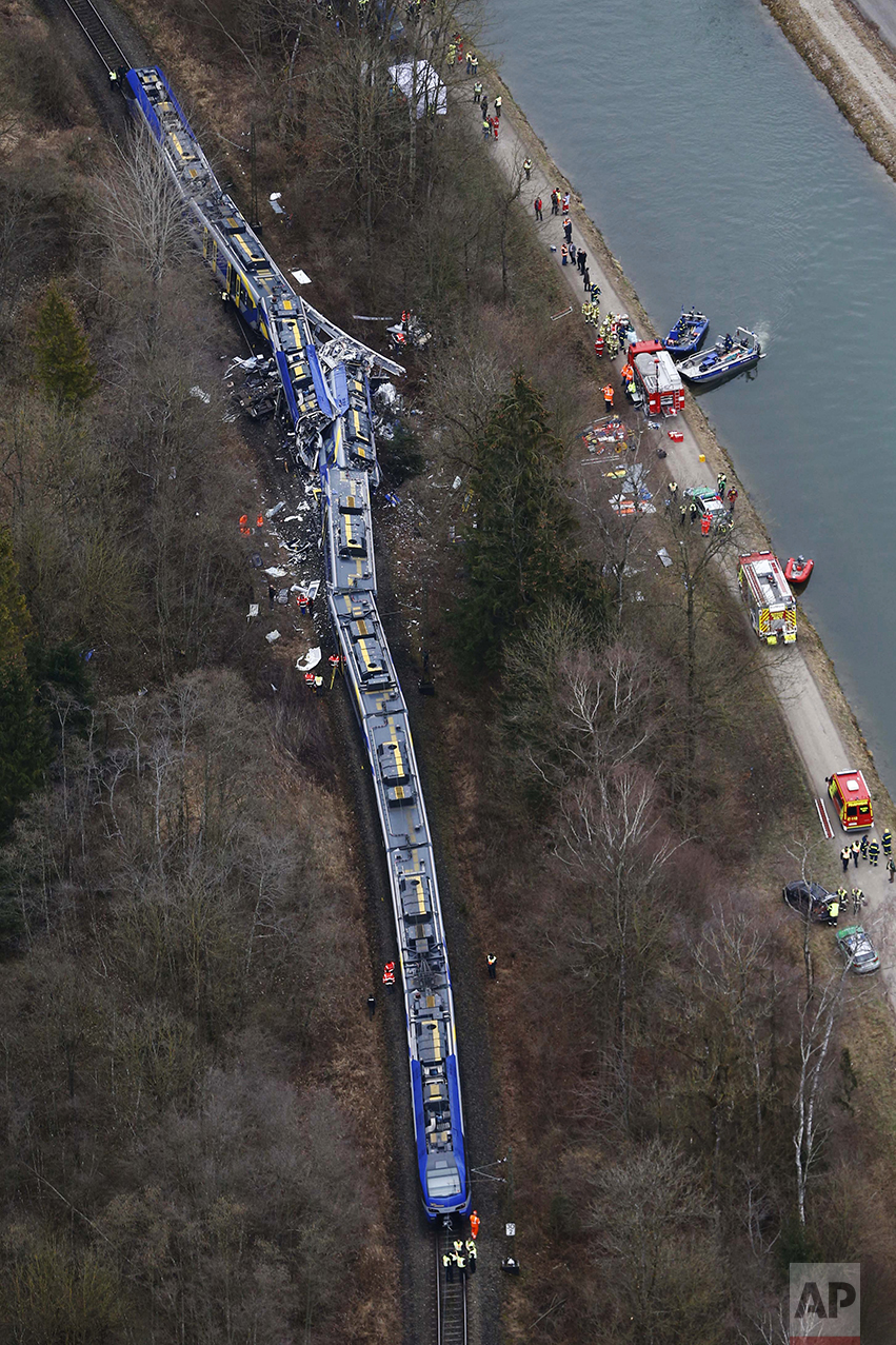  Aerial view of rescue teams at the site where two trains collided head-on near Bad Aibling, Germany, on Feb. 9, 2016. Several people were killed and dozens were injured in the crash. (AP Photo/Matthias Schrader) 