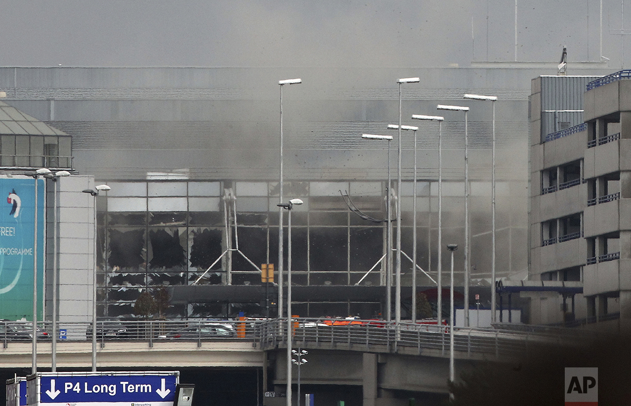  Smoke billows from the Zaventem Airport in Brussels after an explosion there on March 22, 2016. Bombs struck the Brussels airport and one of the city's metro stations, killing and wounding dozens of people, as a European capital was again locked dow