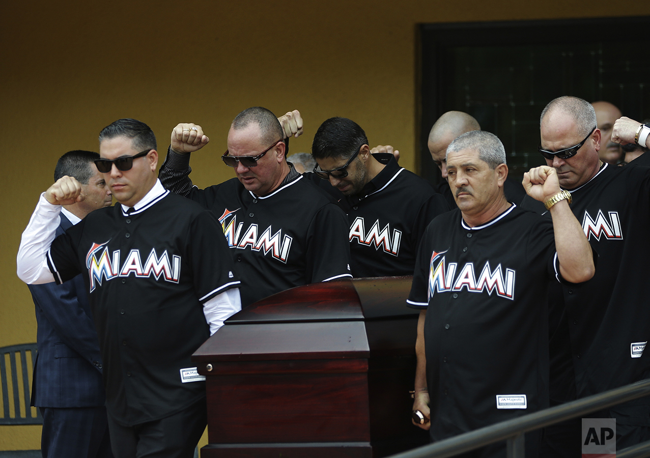  Pallbearers wearing Miami Marlins jerseys carry the casket of Miami Marlins pitcher Jose Fernandez, after a funeral service at St. Brendan's Catholic Church in Miami on Sept. 29, 2016. Fernandez was killed in a boating accident along with two friend