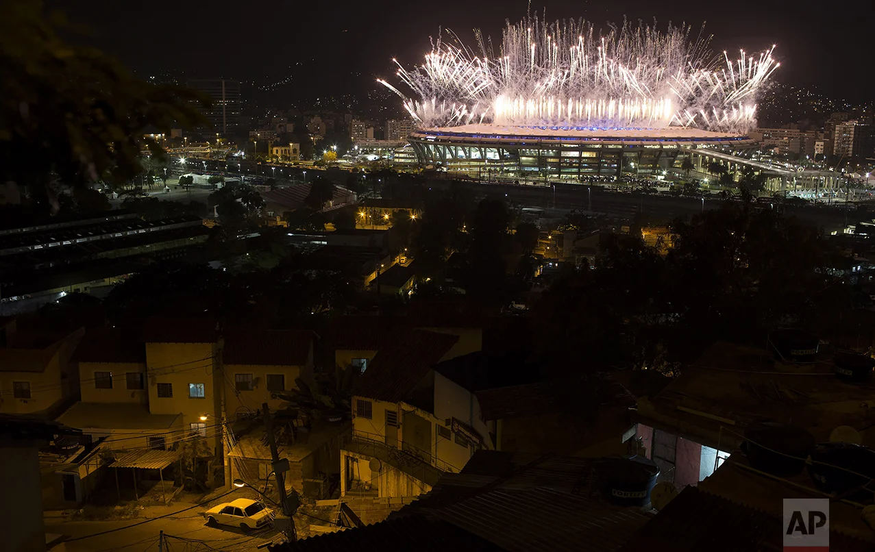 Fireworks explode above the Maracana stadium during the opening ceremony of the 2016 Summer Olympics in Rio de Janeiro, Brazil, on Aug. 5, 2016. (AP Photo/Leo Correa)