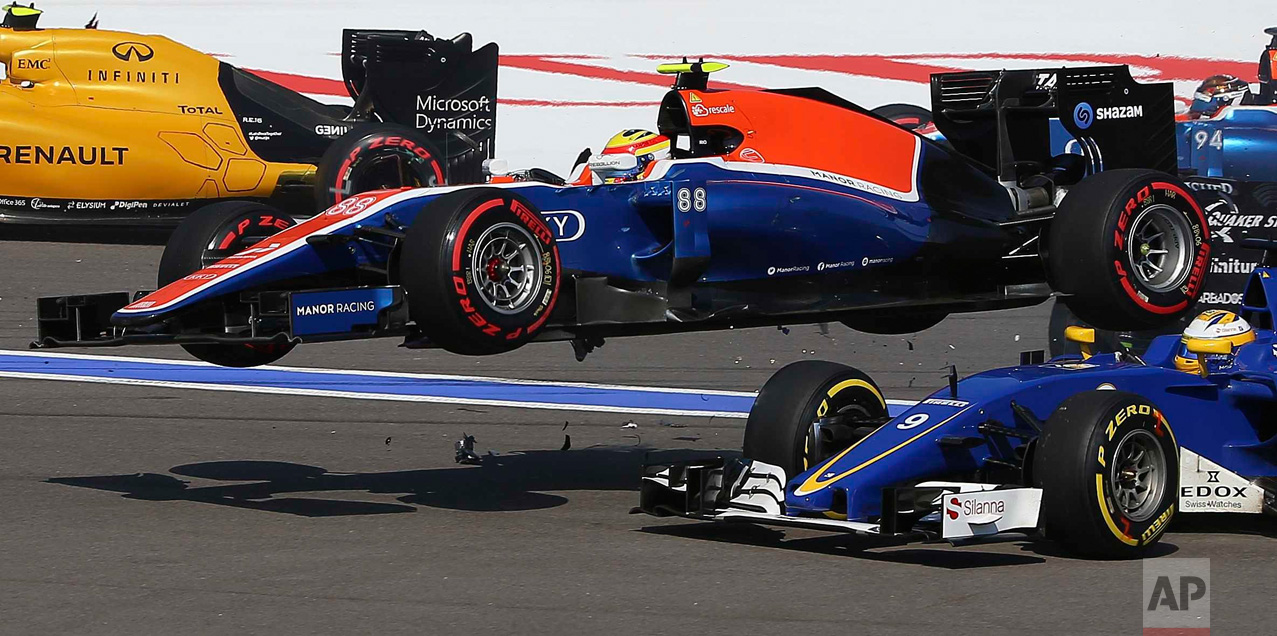  In this Sunday, May 1, 2016 photo, Manor driver Rio Haryanto of Indonesia flies over Sauber driver Marcus Ericsson of Sweden during an accident at the start of the Formula One Russian Grand Prix at the Sochi Autodrom racetrack in Sochi, Russia.(AP P