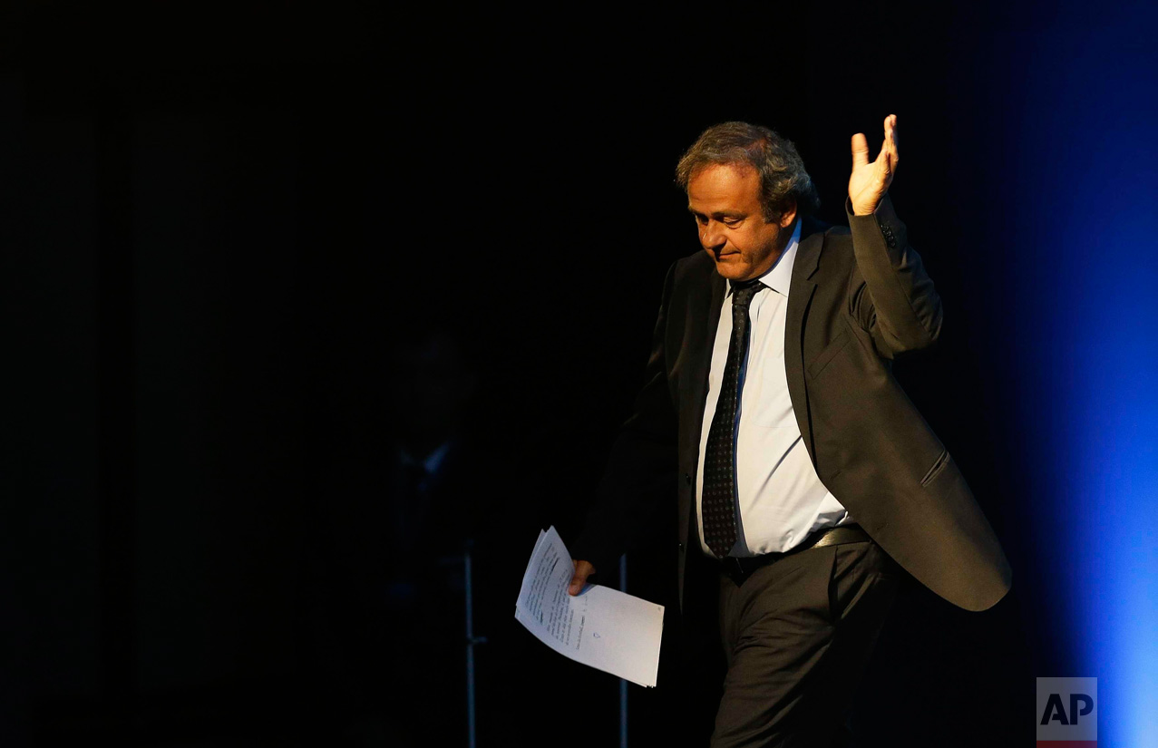  In this Wednesday, Sept. 14, 2016 photo, former UEFA President Michel Platini waves after his speech during the vote for the new UEFA president a in Athens. European soccer federations will elect Wednesday a new UEFA president to replace Michel Plat