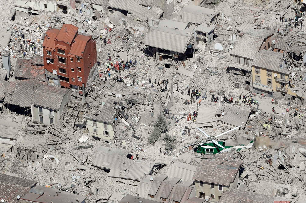  This aerial photo shows the damaged buildings in the historical part of the town of Amatrice, central Italy, after an earthquake on Aug. 24, 2016. The magnitude 6 quake struck at 3:36 a.m. (0136 GMT) and was felt across a broad swath of central Ital