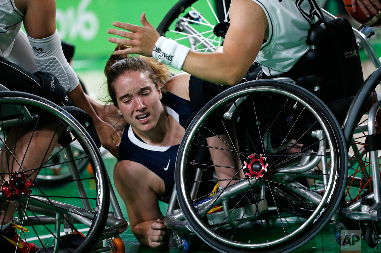  In this Sept. 16, 2016 photo, United States' Rebecca Murray falls during a women's gold medal wheelchair basketball game against Germany at the Paralympic Games in Rio de Janeiro, Brazil. United States won the gold. (AP Photo/Silvia Izquierdo) 