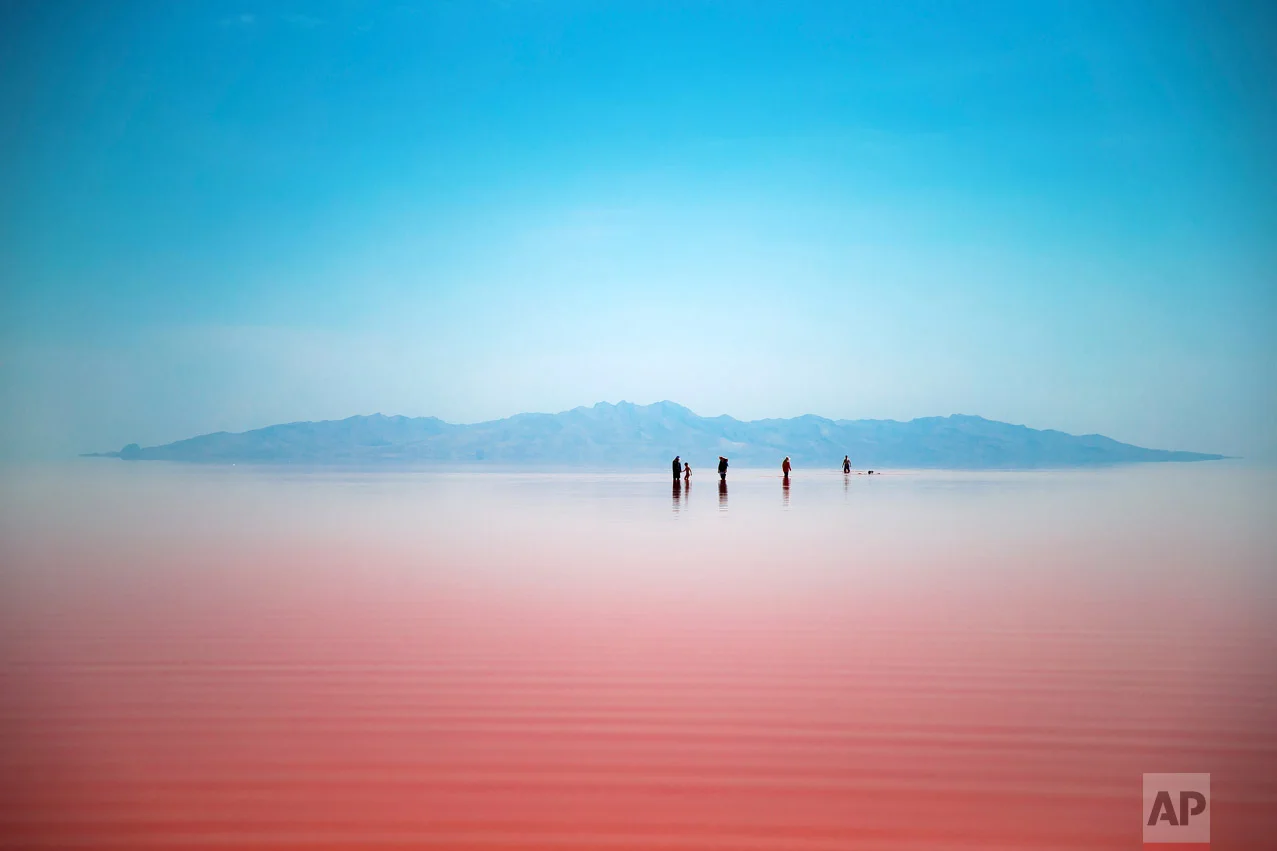Iranians spend time in Urmia Lake near Urmia, North-western Iran, Friday, Aug. 26, 2016. (AP Photo/Ebrahim Noroozi)