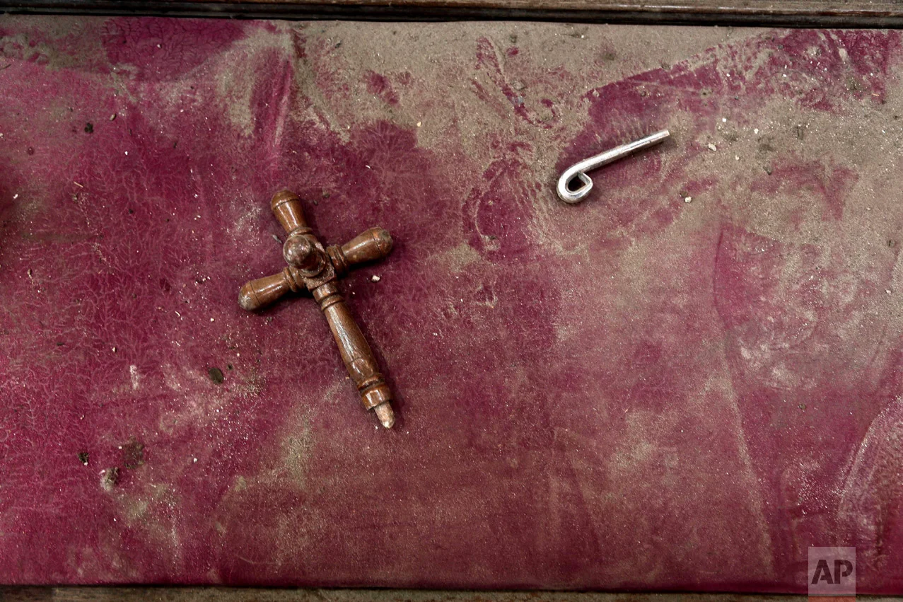 A damaged bench inside the St. Mark Cathedral in central Cairo, following a bombing, Sunday, Dec. 11, 2016. (AP Photo/Nariman El-Mofty)