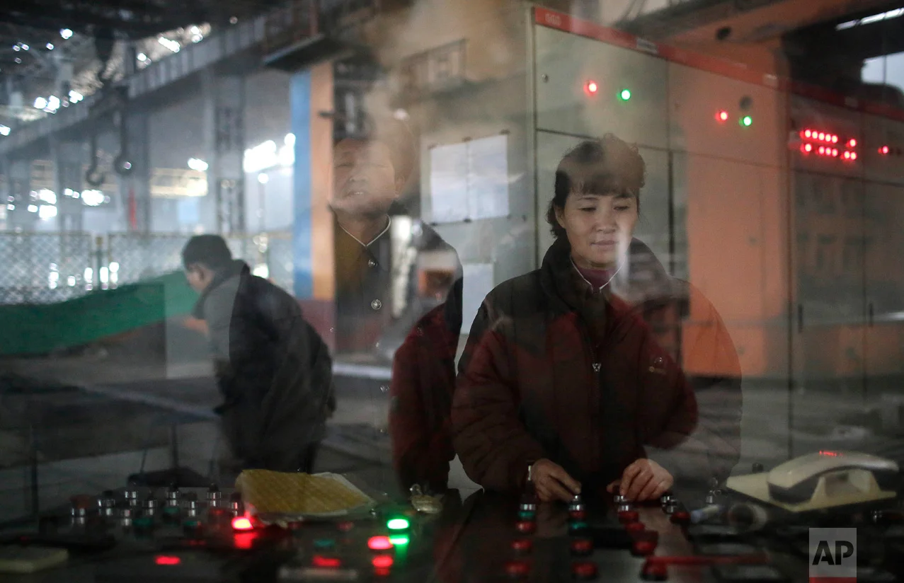 In this Saturday, Jan. 7, 2017 photo, North Korean workers operate an electric furnace at the Chollima Steel Complex in Nampo, North Korea. North Korean officials and factory managers are scrambling to answer a call from leader Kim Jong Un for an all-out, nationwide effort to build up the country’s economy in 2017. The sprawling Chollima complex south of Pyongyang, the capital, is a focal point of North Korea’s effort to expand the economy and lift the nation’s standard of living. One of seven North Korean steel works, Chollima has more than 8,000 workers and is among the North’s showcase enterprises. (AP Photo/Wong Maye-E)