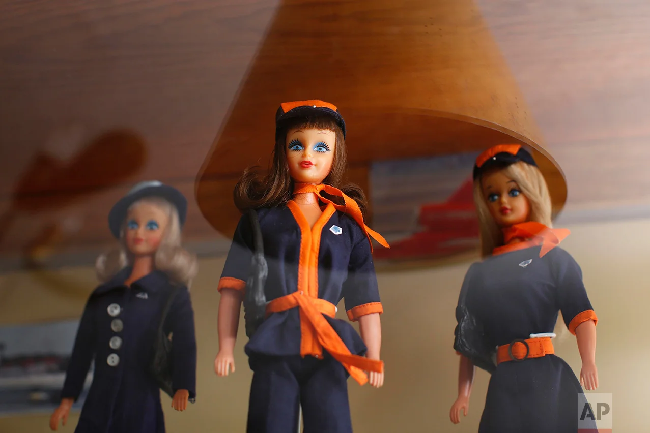 In this Jan. 6, 2017 photo, 1977 Barbara Lili dolls, the Mexican version of the Barbie doll, wearing AeroMexico flight attendant uniforms are displayed prior to the opening of a large Barbie doll exhibit at the Mexico Antique Toy Museum in Mexico City. Among the millions of items displayed in this museum, all sorts of Mexican wrestling paraphernalia and old traditional Mexican toys remind Mexicans of their rich cultural heritage as well as a blunt reminder that before the North American Free trade agreement was signed in the 1990's, Mexico had a robust, healthy and creative national toy industry that is now practically defunct. (AP Photo/Dario Lopez-Mills)