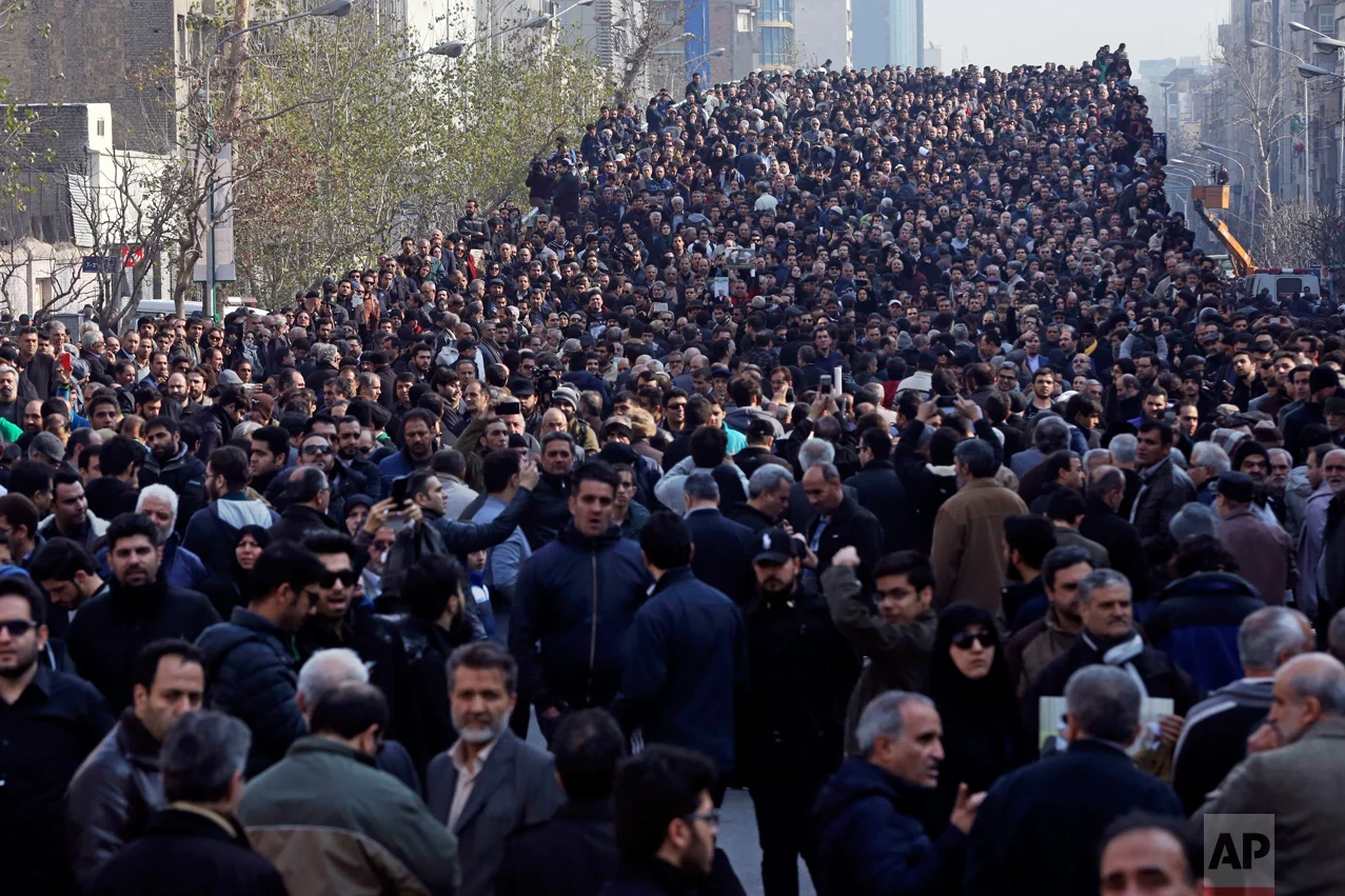 Mourners attend the funeral of former Iranian President Akbar Hashemi Rafsanjani, in Tehran, Iran, Tuesday, Jan. 10, 2017. Hundreds of thousands of mourners flooded the streets of Tehran, beating their chests and wailing in grief for Rafsanjani, who died at the age of 82. (AP Photo/Vahid Salemi)