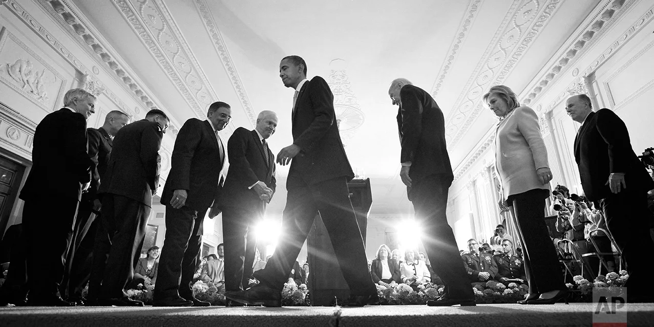 President Barack Obama walks to the Rose Garden at the White House in Washington to make a statement to reporters, Thursday, Oct. 20, 2011. (AP Photo/Charles Dharapak)