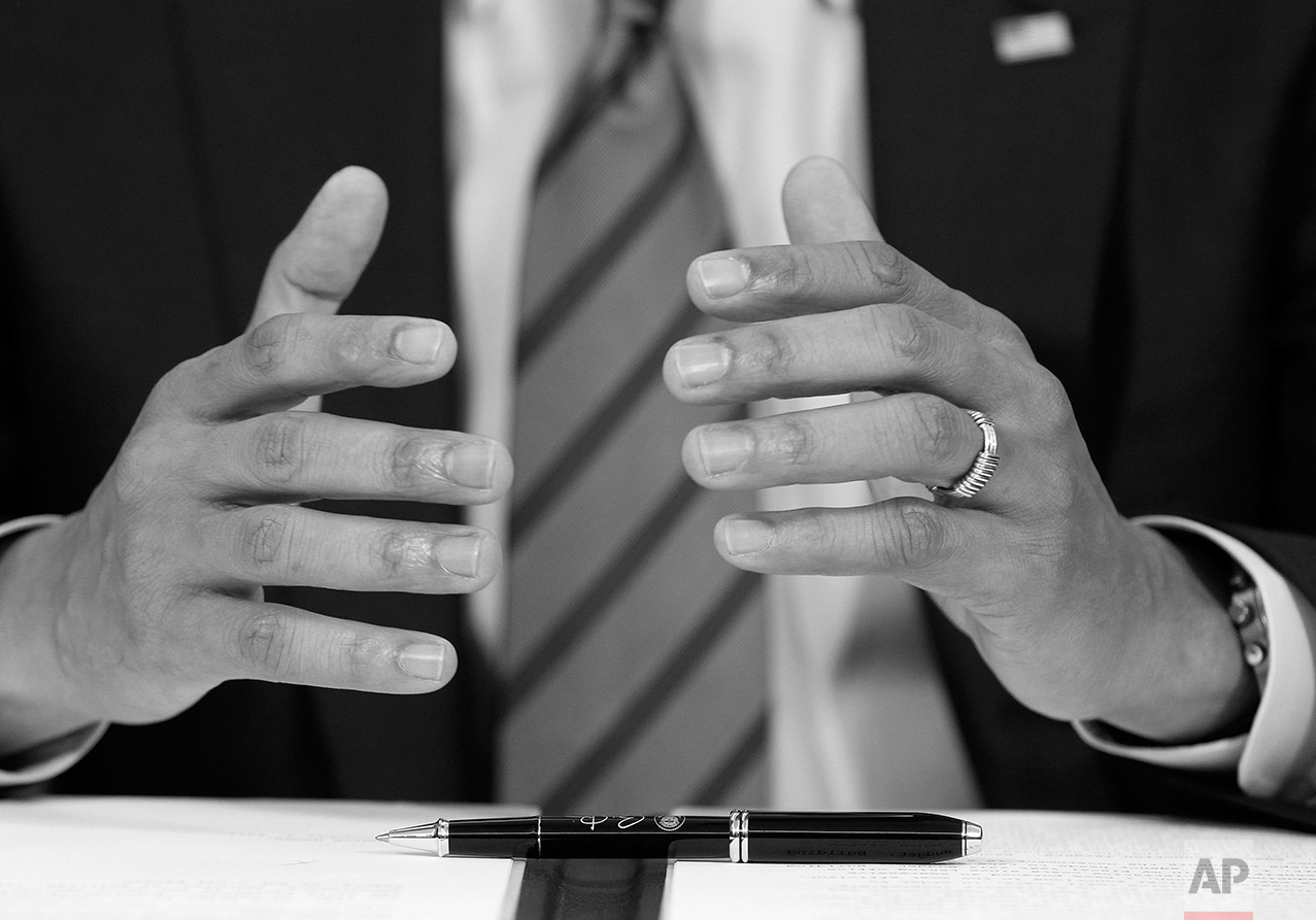 The presidential pen awaits the hand of President Barack Obama as he speaks before signing an Executive Order to cut waste and promote efficient spending across the federal government in the Oval Office at the White House in Washington, Wednesday, Nov. 9, 2011. (AP Photo/Charles Dharapak)