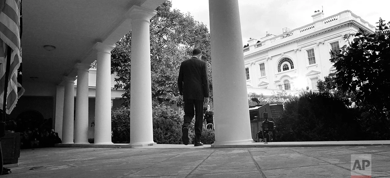 President Barack Obama walks to the Rose Garden at the White House in Washington to make a statement to reporters, Thursday, Oct. 20, 2011. (AP Photo/Charles Dharapak)