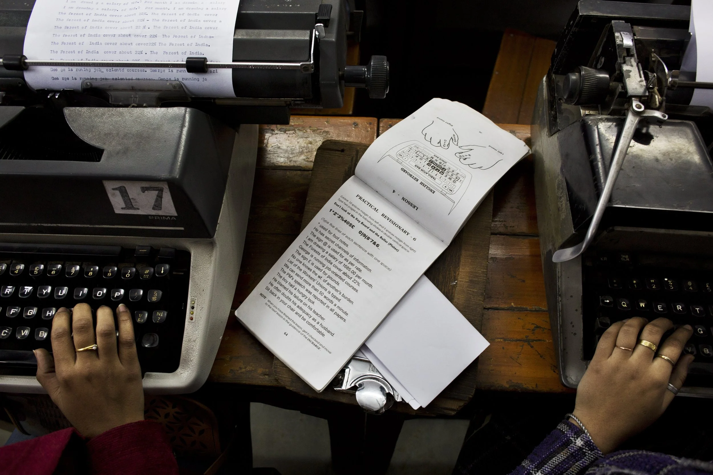 In this Jan. 17, 2017 photo, Indian students practice at a local typewriting school in New Delhi, India. Twenty years ago, there were hundreds of little typing schools in New Delhi, crowded with university students, aspiring clerks and young women hoping for jobs as secretaries. But around 2000, things started to slow down. First the foreign companies, Facet, Remington, closed their Indian operations. Then, in 2009, the Indian firm Godrej and Boyce shut down the country’s last typewriter production line. (AP Photo/Bernat Armangue)