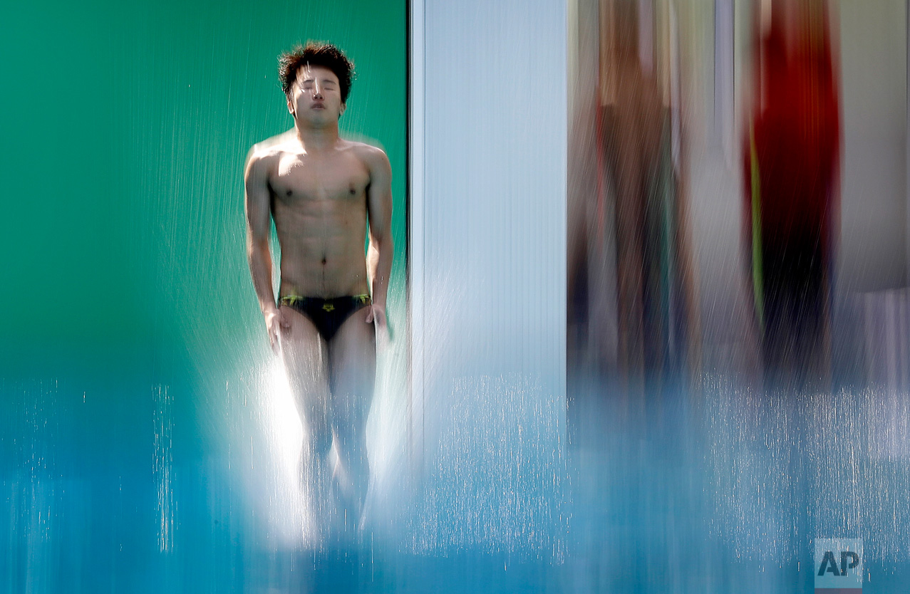 South Korean diver Woo Ha-ram takes part in a training session at the Maria Lenk Aquatic Center ahead of the 2016 Summer Olympics in Rio de Janeiro, Brazil, Thursday, Aug. 4, 2016. (AP Photo/Wong Maye-E)
