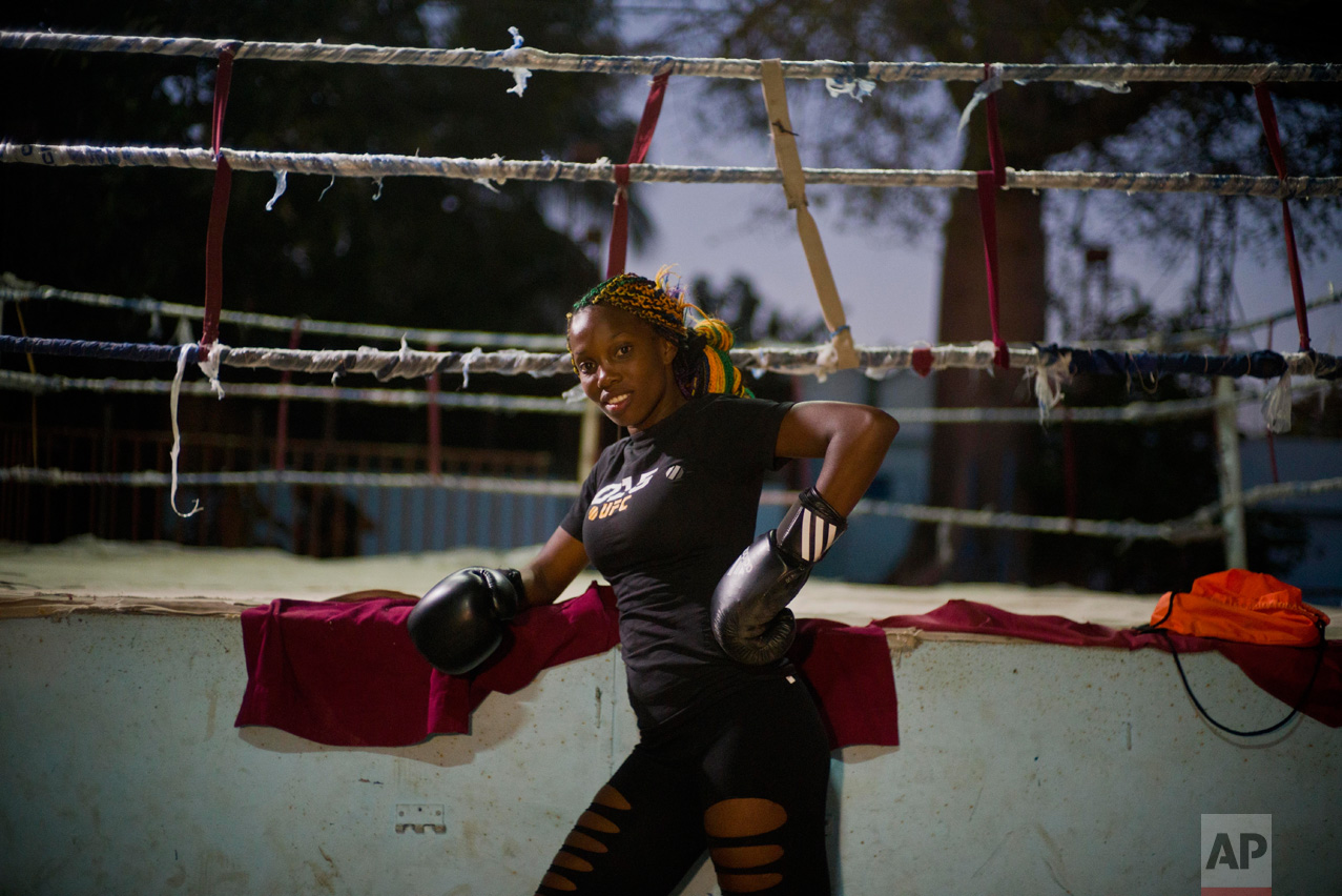 In this Jan. 24, 2017 photo, boxer Legnis Cala poses for a photo before a training session, at a sports center in Havana, Cuba. Women were first allowed to box at the Olympics during the 2012 Summer Olympics but they are still not allowed to box in Cuba. (AP Photo/Ramon Espinosa)