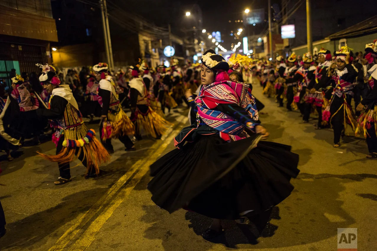 Peru highlands revel in blast of festival color — AP Photos