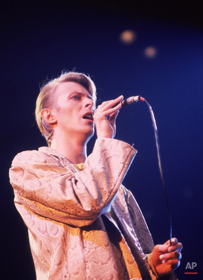 British rock singer, David Bowie, shown performing at a New York concert in May 1978. (AP Photo/Brian Killigrew)