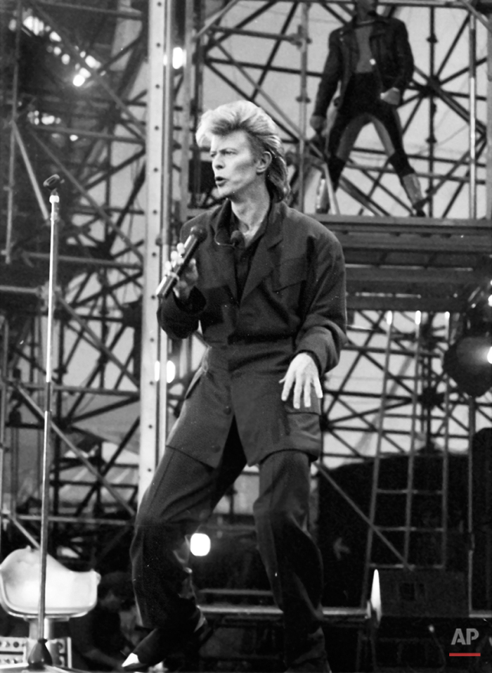 David Bowie performs on stage during his concert at Wembley Stadium on Saturday, June 20, 1987. (AP Photo)
