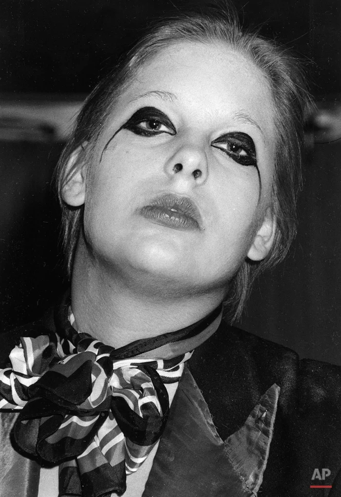 A fan of glitter-rock singing star David Bowie wears makeup at Bowie's weekend concert at New York's Radio City Music Hall, Nov. 3, 1974. (AP Photo/Suzanne Vlamis)