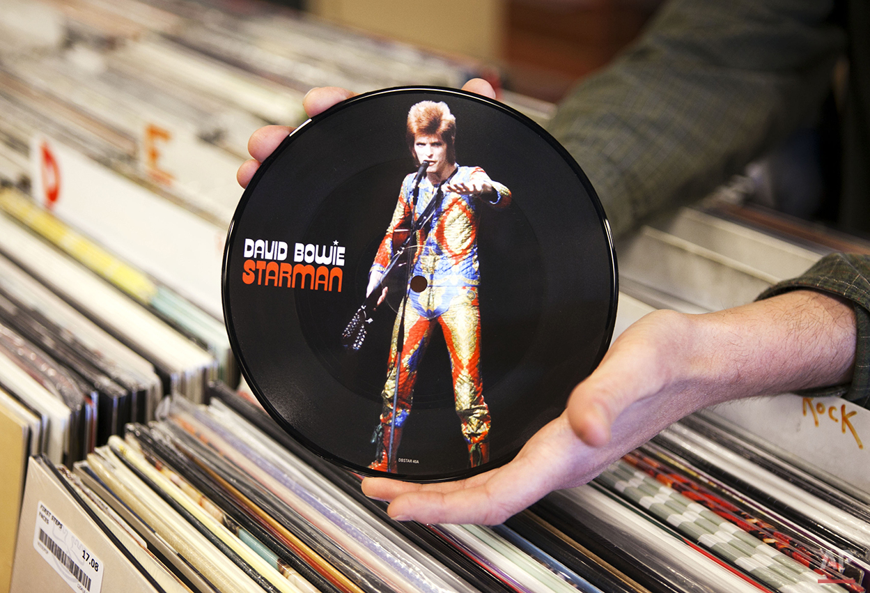 A copy of David Bowie's "Starman" record is seen, Thursday, April 19, 2012, in Scarborough, Maine. The seven-inch vinyl record is being released for Record Store Day on Saturday, April 21. (AP Photo/Robert F. Bukaty)