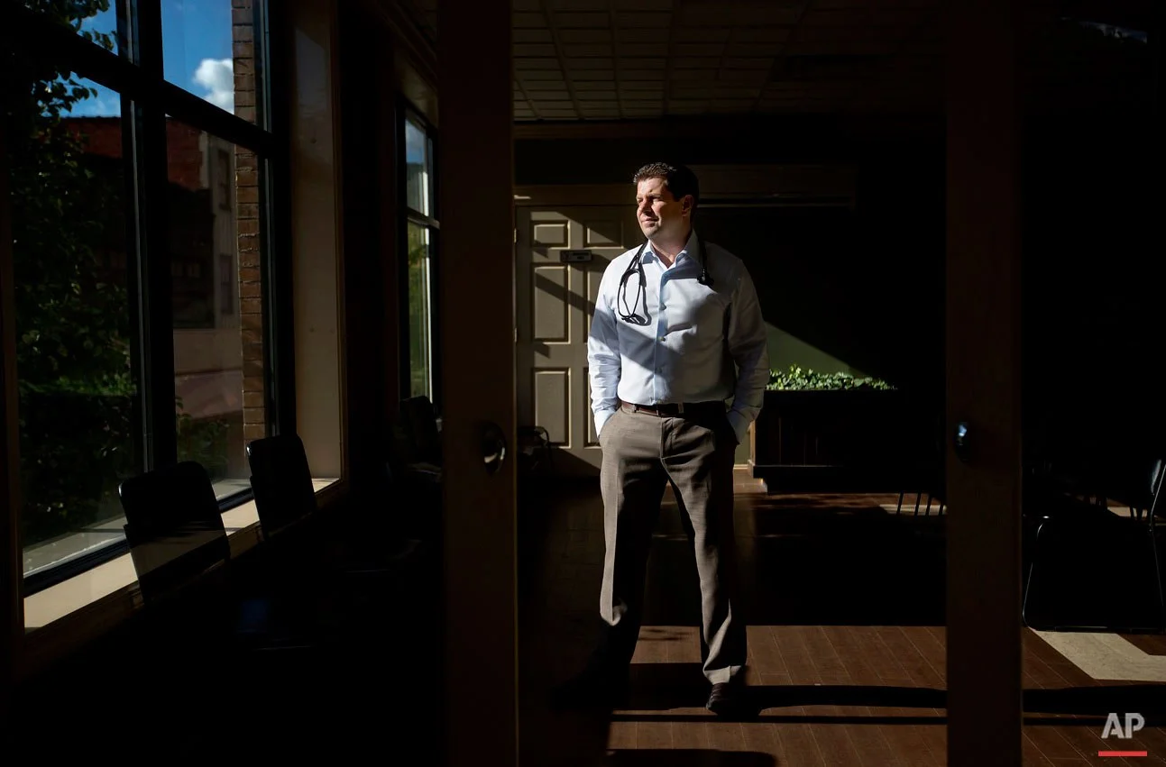 Dr. Donovan “Dino” Beckett stands in the Williamson Health and Wellness Center, a clinic he started to encourage treatment of underserved populations and address the extremely high rates of diabetes patients in the county, Wednesday, Oct. 7, 2015, in Williamson, W.Va. Central Appalachia is not out of ideas, though, and it has not given up. Grass-roots approaches like Beckett’s clinic to improve health, an apprentice program designed to give high school kids a better chance at a good job, and even a small-but-determined coal operation show how Central Appalachia may slowly begin to remake itself. “We still have a lot of diabetes patients, but now we have a lot of well-controlled diabetes patients,” Beckett said. (AP Photo/David Goldman)