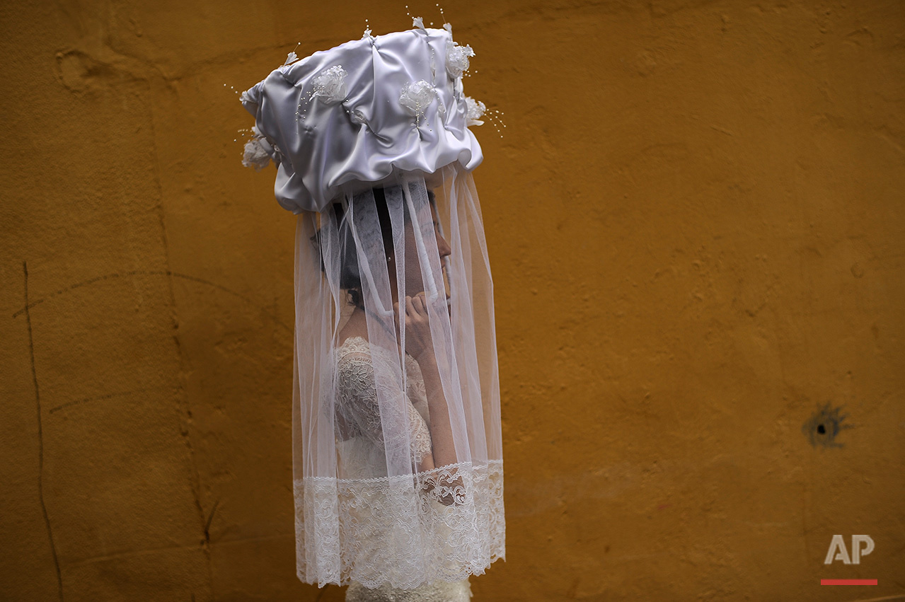  A participant in the ''Bread Procession of the Saint'' takes part in a ceremony in honor of Domingo de La Calzada Saint (1019-1109), in Santo Domingo de La Calzada, northern Spain, Wednesday, May 11, 2016. Every year during spring season, ''Las Donc