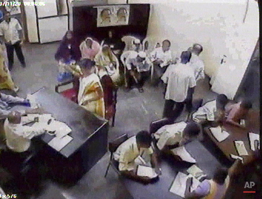  This file image made from security camera footage released by Sri Lanka police, Friday, Nov. 30, 2007, shows a female suicide bomber identified by police as 24-year-old Sujatha Vagawanam, on a mission to kill a Sri Lankan Cabinet minister. Vagawanam
