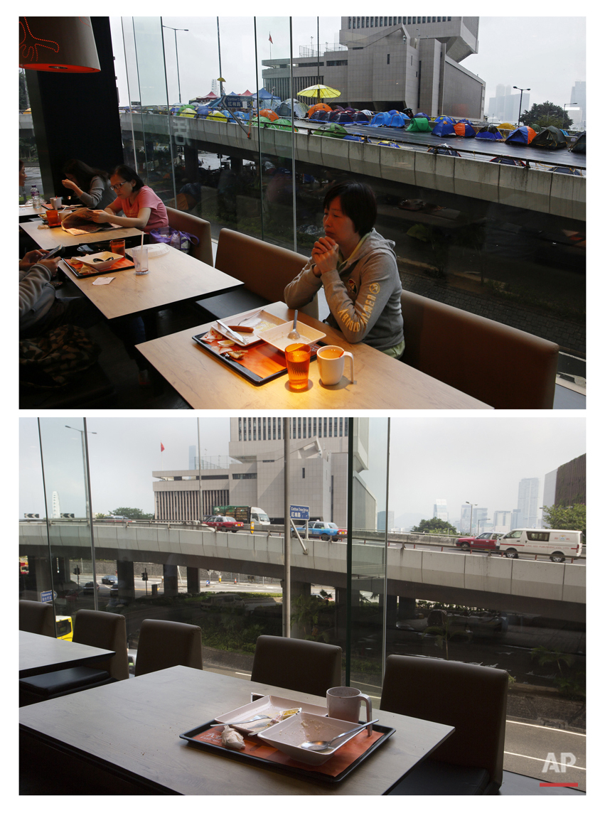  This combination of Nov. 8, 2014 file, top, Sept. 26, 2015 photos shows residents eating breakfast at a fast food restaurant near an elevated road where protesters have camped out to protest during the Umbrella Movement in Hong Kong, and a tray bein